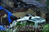 Lucky escape for driver as Scorpio rolls over a house in Ullal